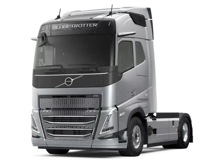 Srebrny ciągnik siodłowy Volvo FH13 Globetrotter z napisem "500" na błotniku, gotowy do dalekich podróży.